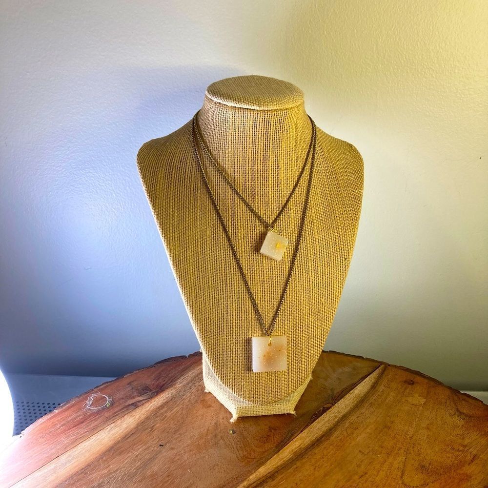 Two layer gold necklace w/ white charms